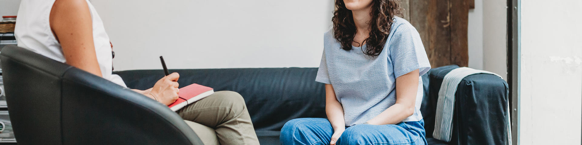 People talking on a couch